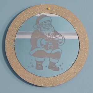 Santa Holding Toy Train Mirror